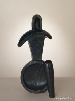 Sittande geometrisk figur