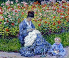 Camille Monet och ett barn i konstnärens trädgård i Argenteuil