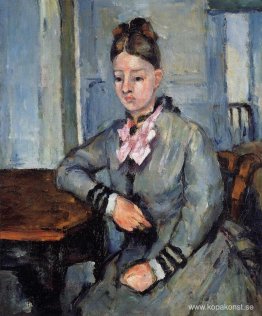 Madame Cezanne lutad mot ett bord