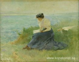 Kvinna på stranden